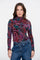 Geisha dames top met turtleneck en kleurrijke print