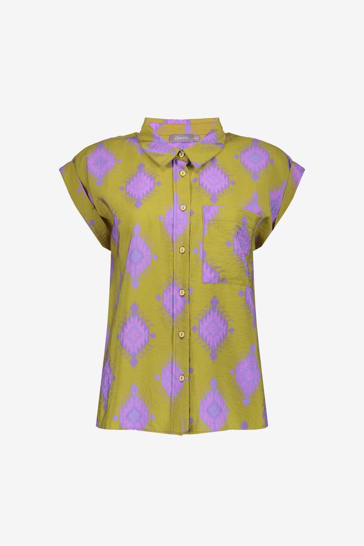 Geisha Fashion shirt, buttoned with geometric patterns, against white.
