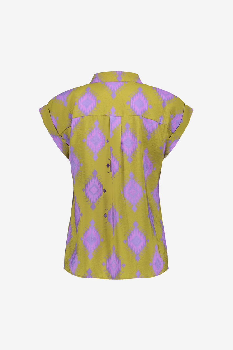 Geisha Fashion shirt, buttoned with geometric patterns, against white.