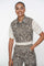 Geisha Fashion: Woman modeling leopard print outfit, plain background.
