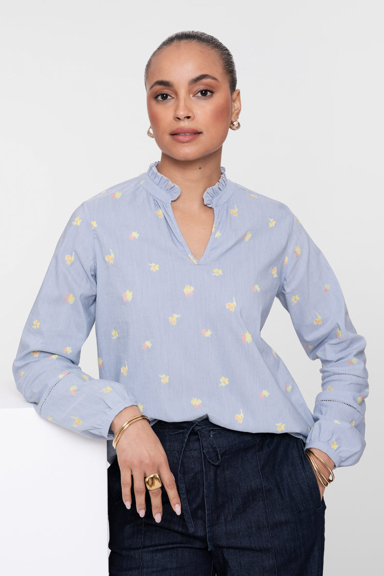 Geisha top met bloemenprint en ronde hals met opstaande ruffle