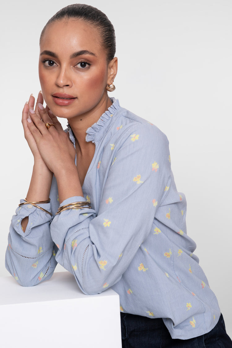 Geisha top met bloemenprint en ronde hals met opstaande ruffle