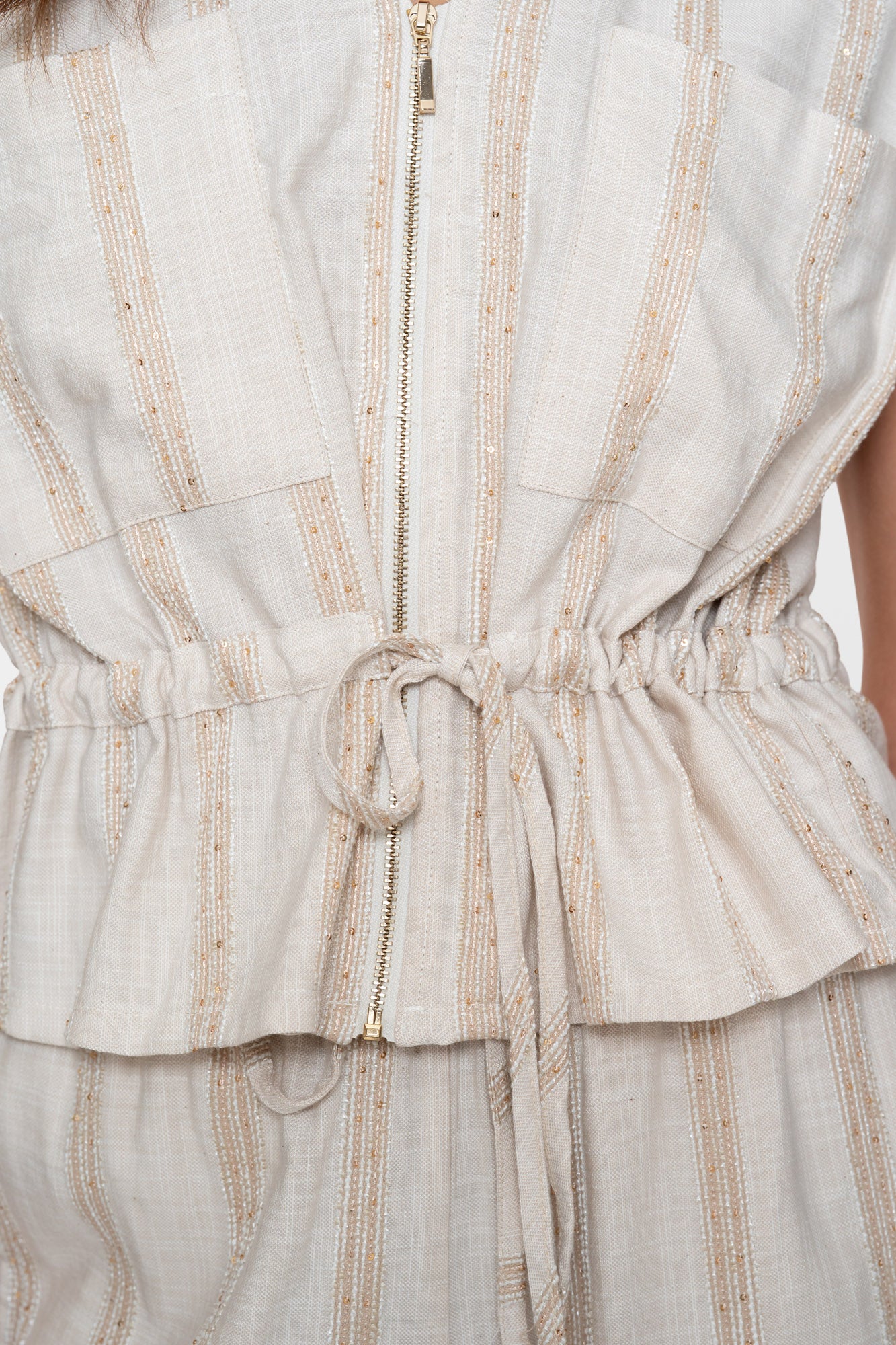 Geisha peplum top met streepdessin en subtiele shimmer