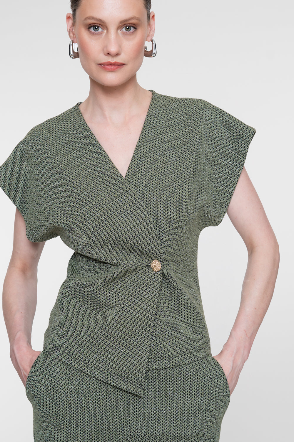 Geisha top met overslagdetail en subtiele lurexglans