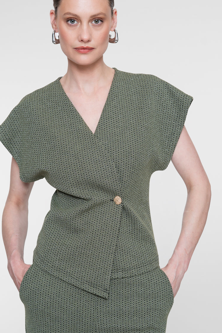 Geisha top met overslagdetail en subtiele lurexglans