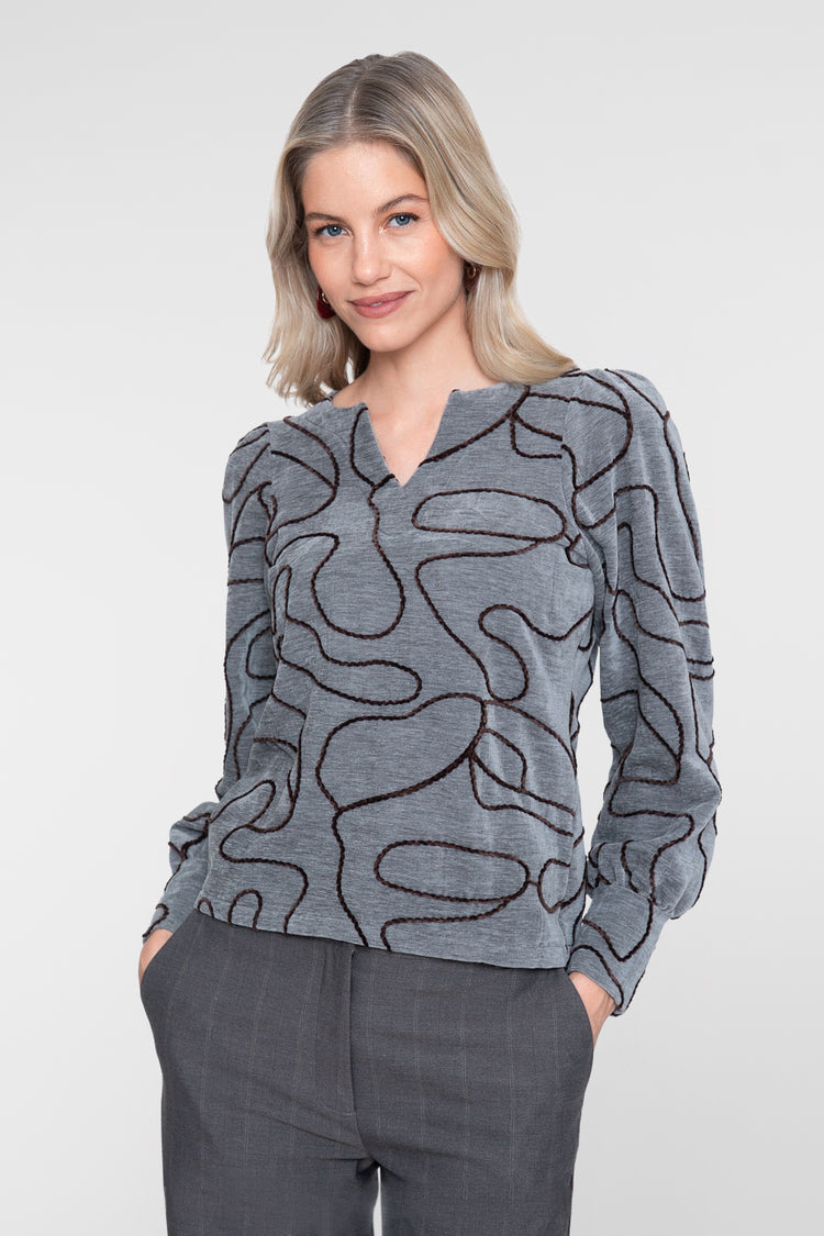Geisha top met grafische lijnprint en V-snit