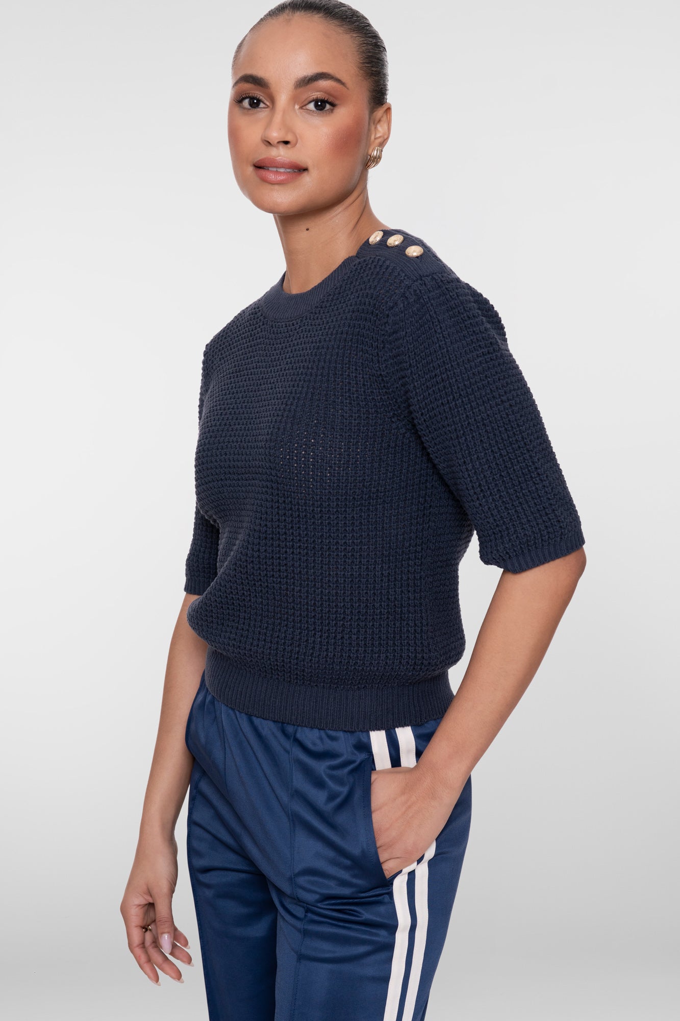 Geisha gebreide top met goudkleurige knopen