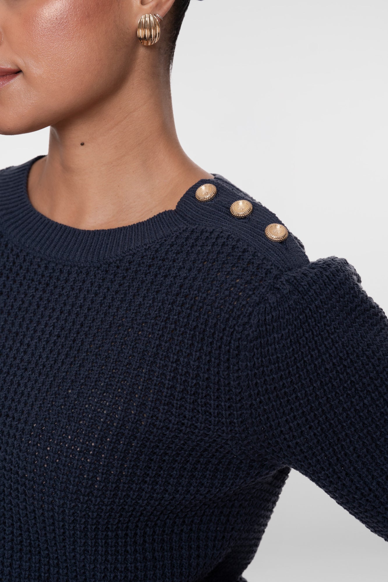 Geisha gebreide top met goudkleurige knopen